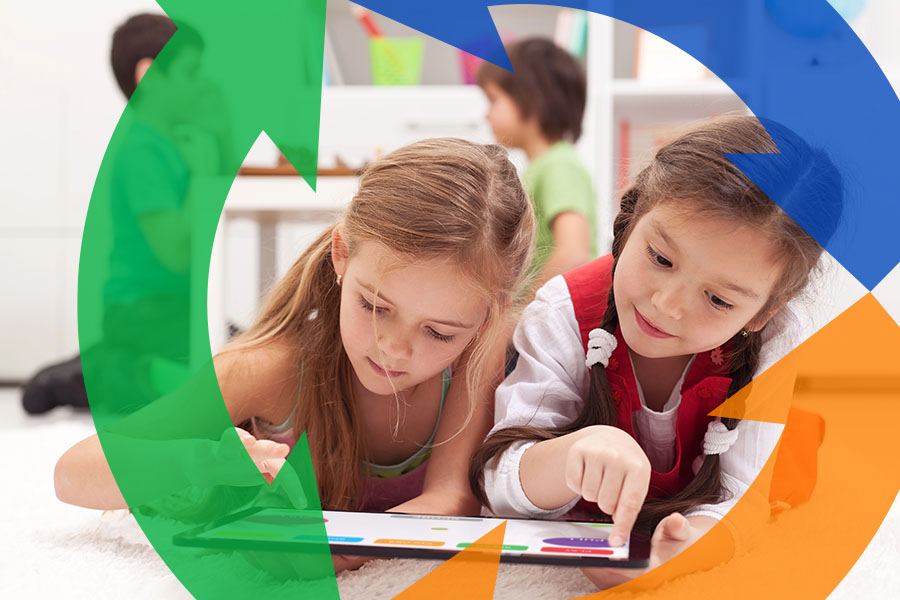 Two kids sit on the floor using a tablet with a Conexon icon around for thumbnail.