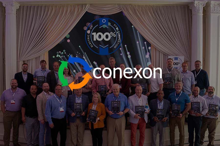 Co-op team members receiving the 100 club awards with a conexon logo overtop.